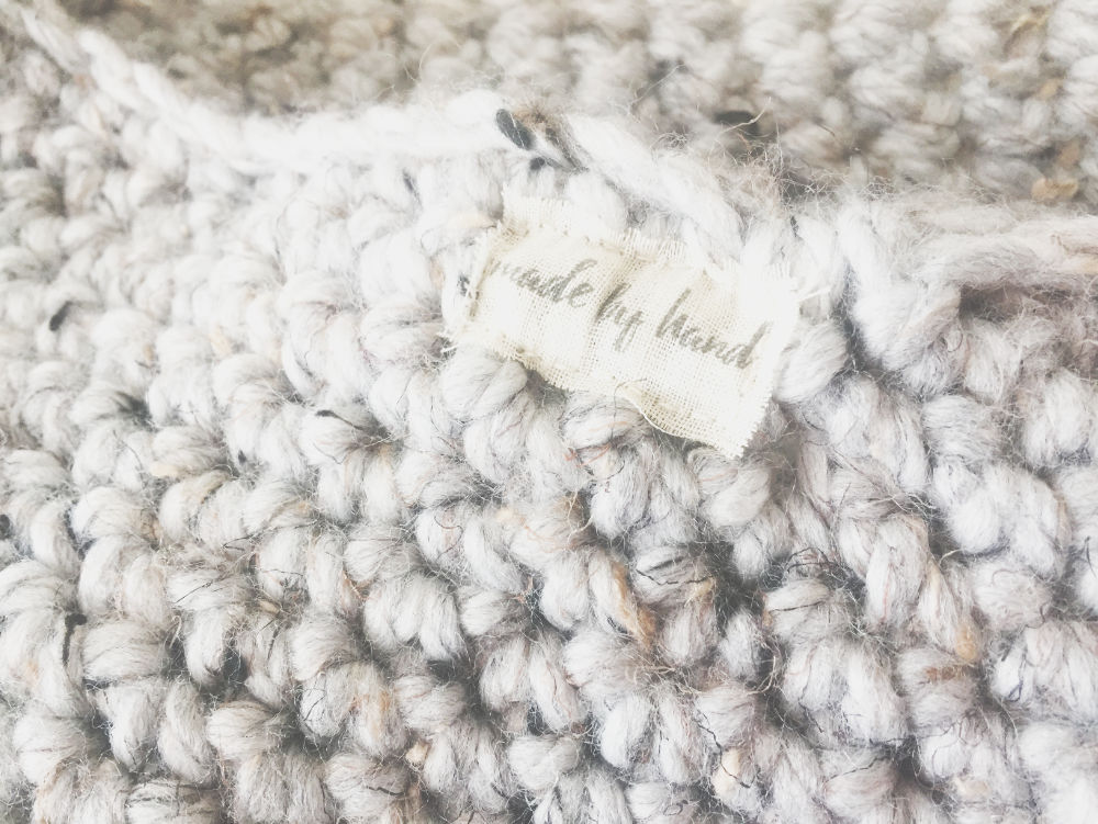 patch label attached to a crochet cowl