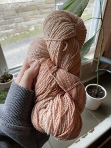 Pink yarn hand dyed with natural dye made from avocado skins